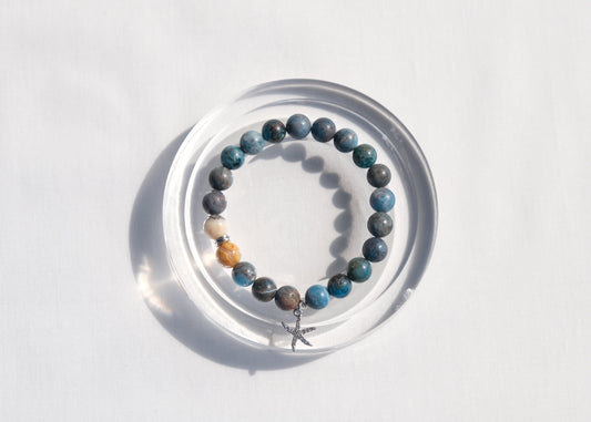 Bracelet with multicolored beads on a white background