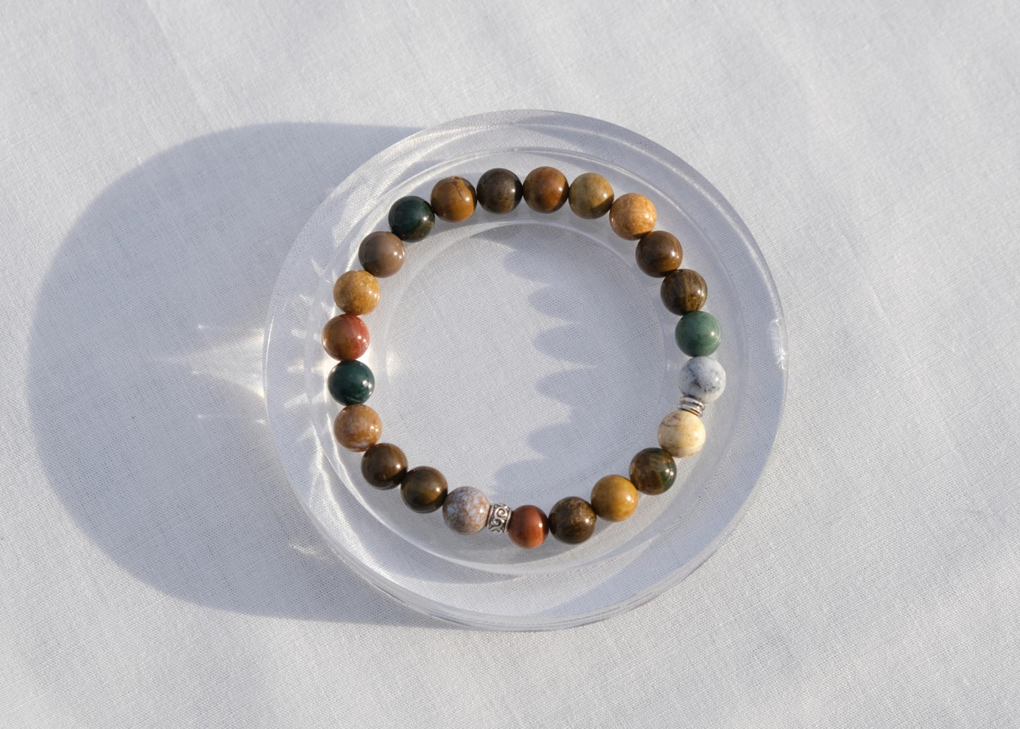 Multicolored beaded bracelet on a white background
