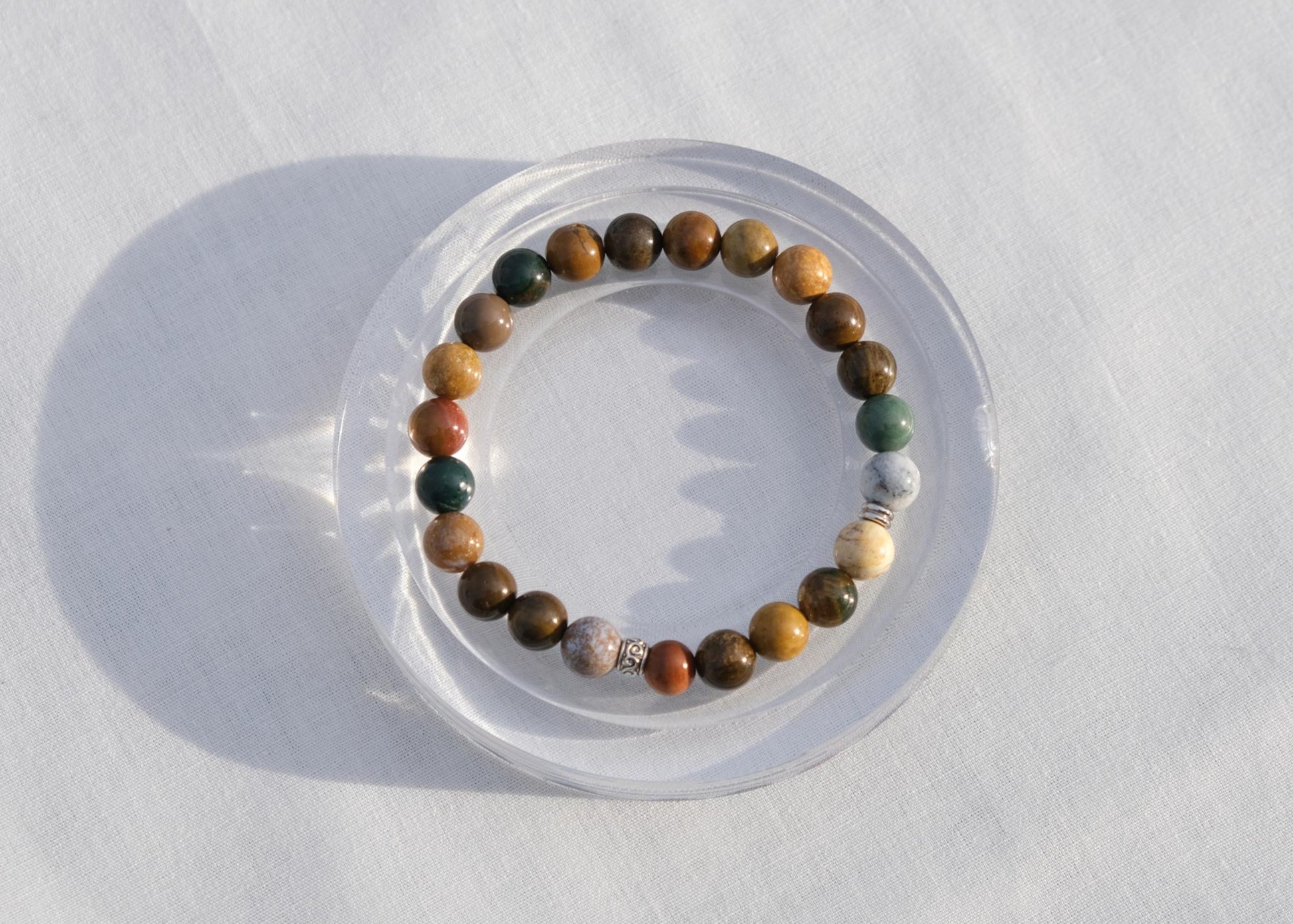 Multicolored beaded bracelet on a white background