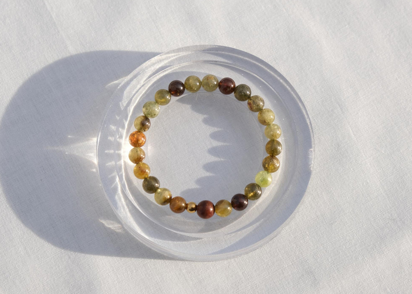Multicolored beaded bracelet on a white surface