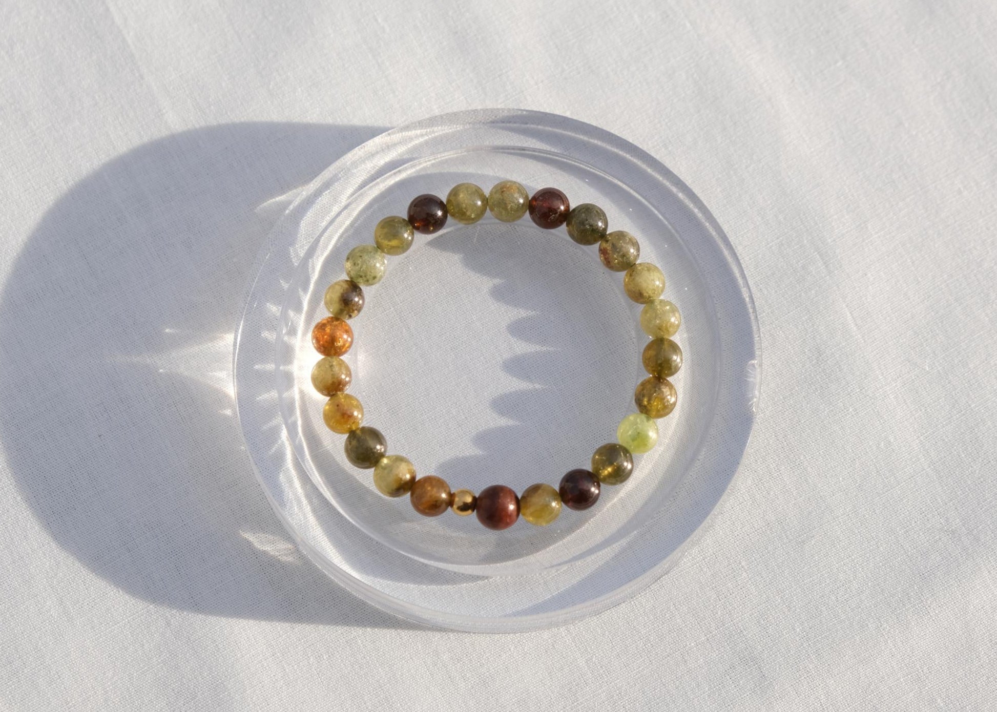 Multicolored beaded bracelet on a white surface
